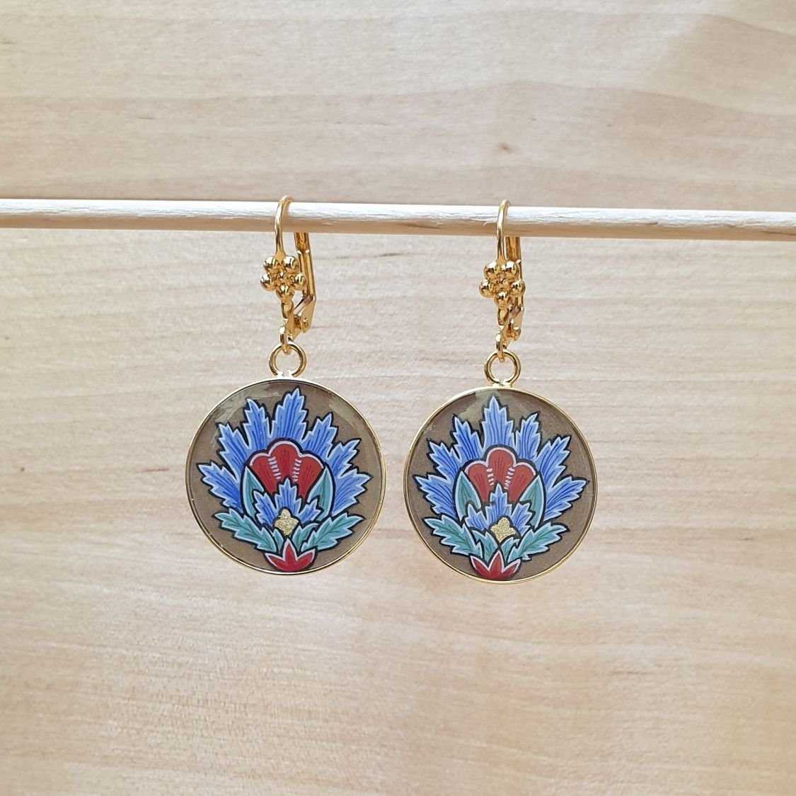 Blauwe oosterse bloem hanger oorbellen
