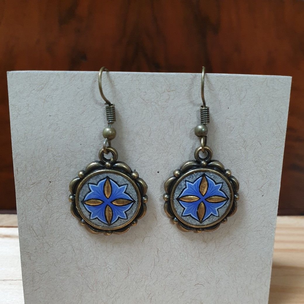 Goud/blauw verlichte hanger oorbellen
