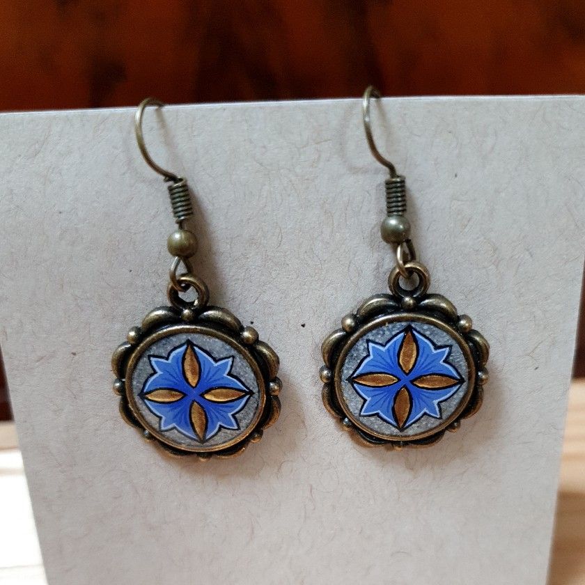 Goud/blauw verlichte hanger oorbellen