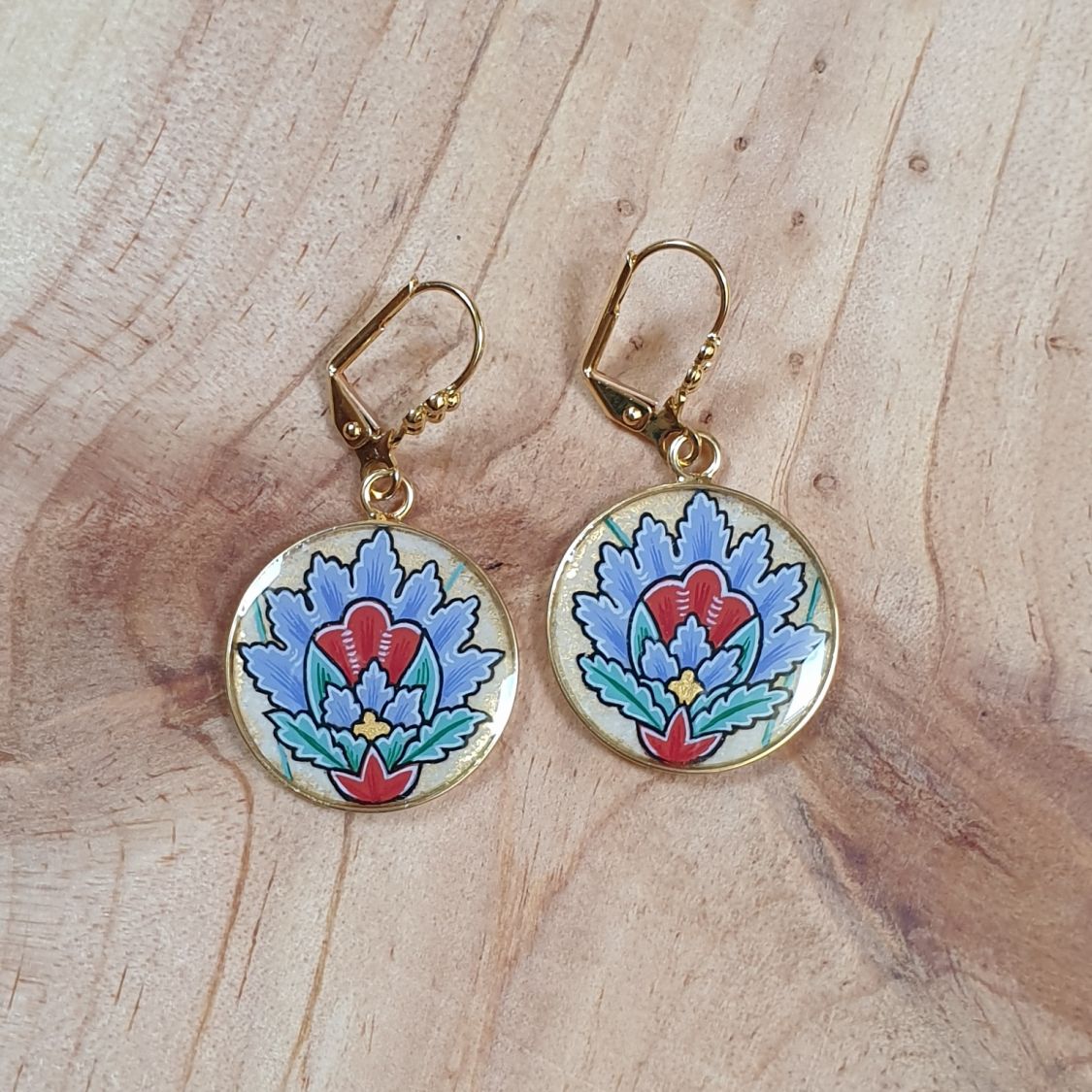 Blauwe oosterse bloem hanger oorbellen