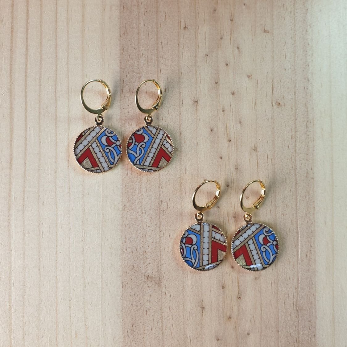 Gouden/rode/blauwe hanger oorbellen