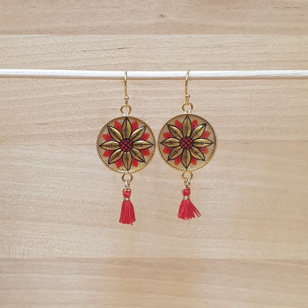 Gouden/blauwe bloem oorbellen