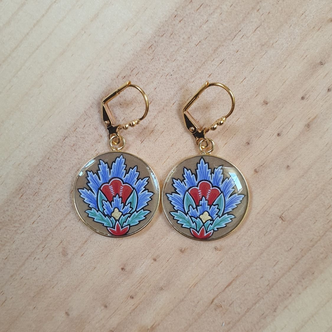 Blauwe oosterse bloem hanger oorbellen