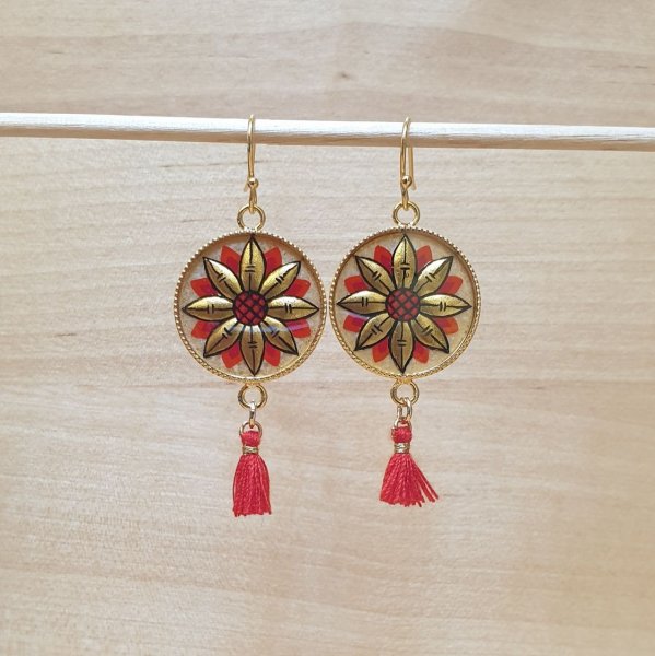 Gouden/blauwe bloem oorbellen