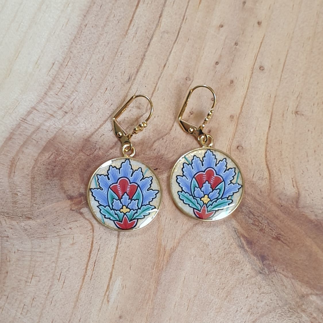 Blauwe oosterse bloem hanger oorbellen