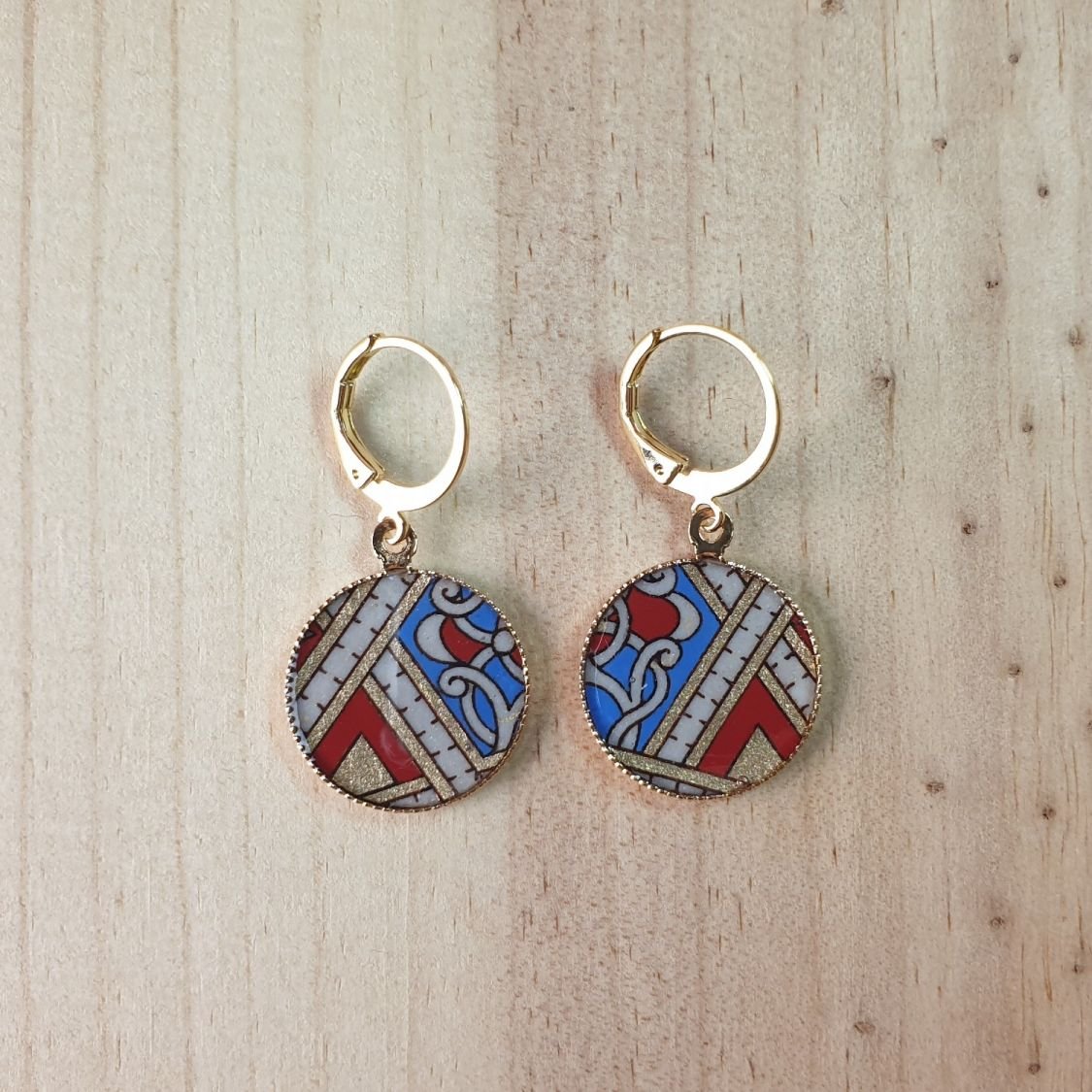 Gouden/rode/blauwe hanger oorbellen