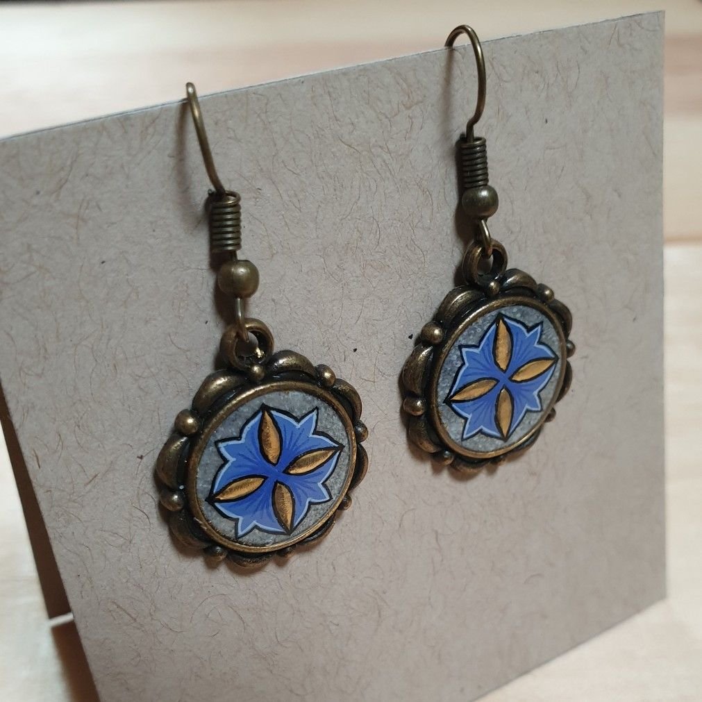 Goud/blauw verlichte hanger oorbellen