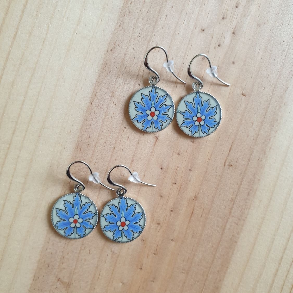 Blauwe oosterse bloem hanger oorbellen