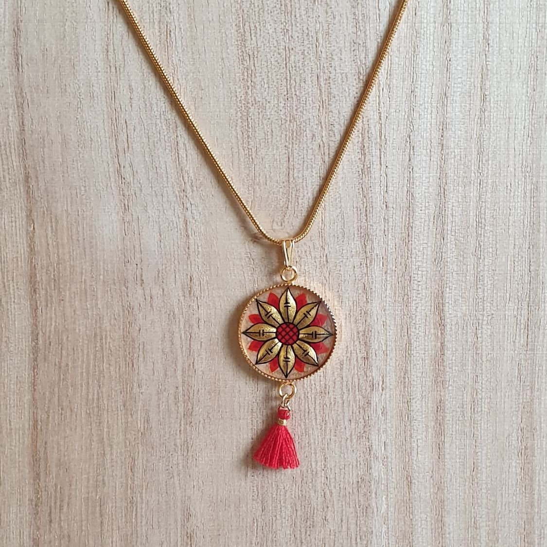 Goud/blauwe bloemen hanger ketting aan gouden ketting