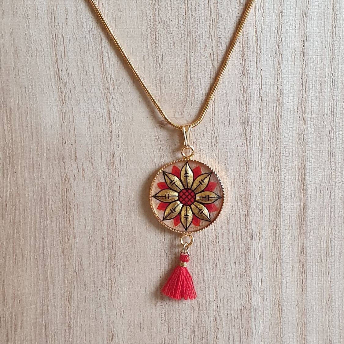 Goud/blauwe bloemen hanger ketting aan gouden ketting