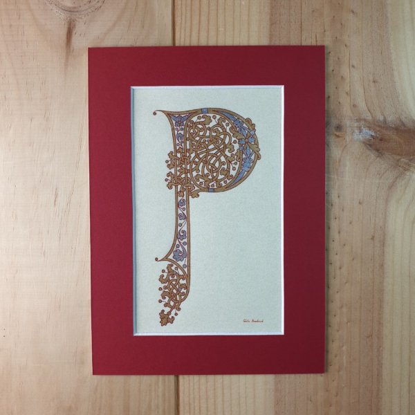 Verlichte letter P in Karolingische stijl