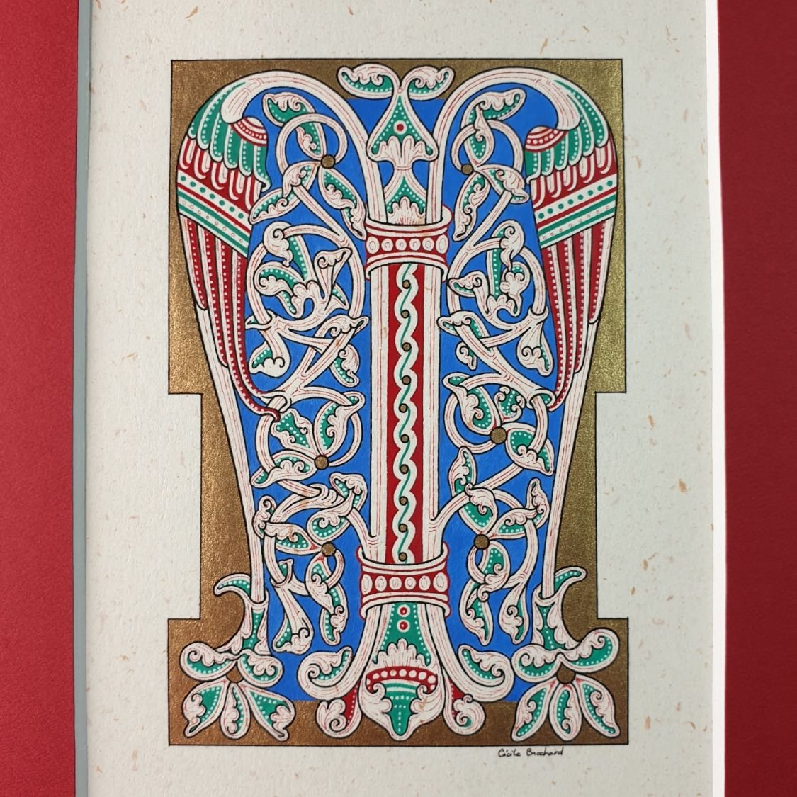Verlichte letter M in Romaanse stijl