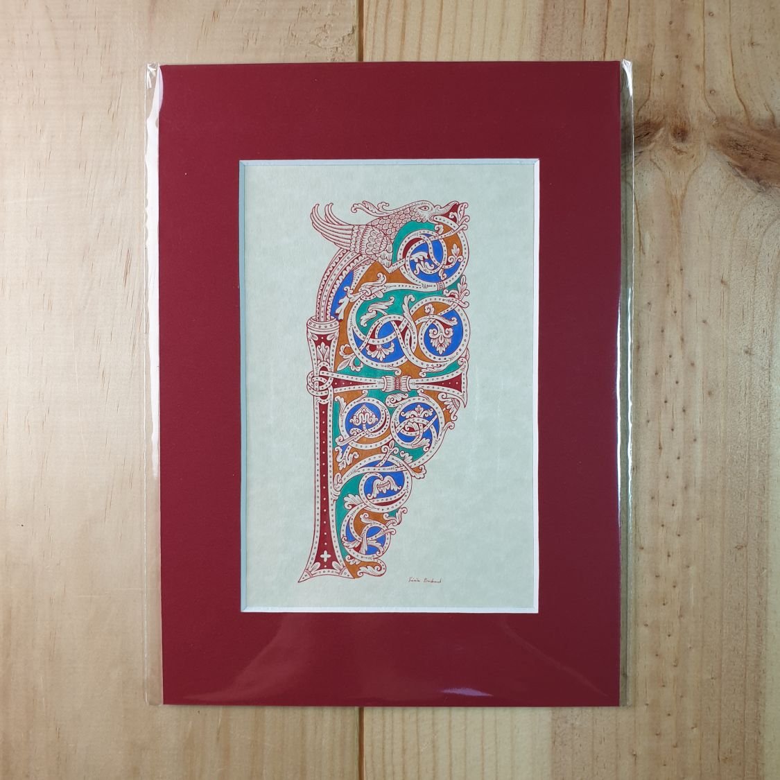Verlichte letter F in Romaanse stijl