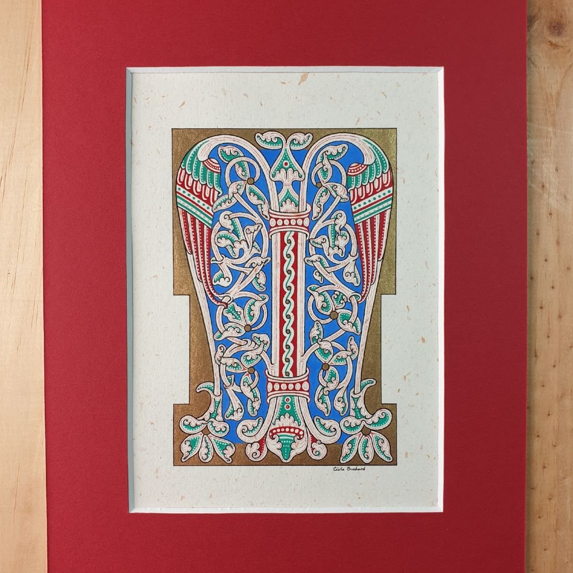Verlichte letter M in Romaanse stijl