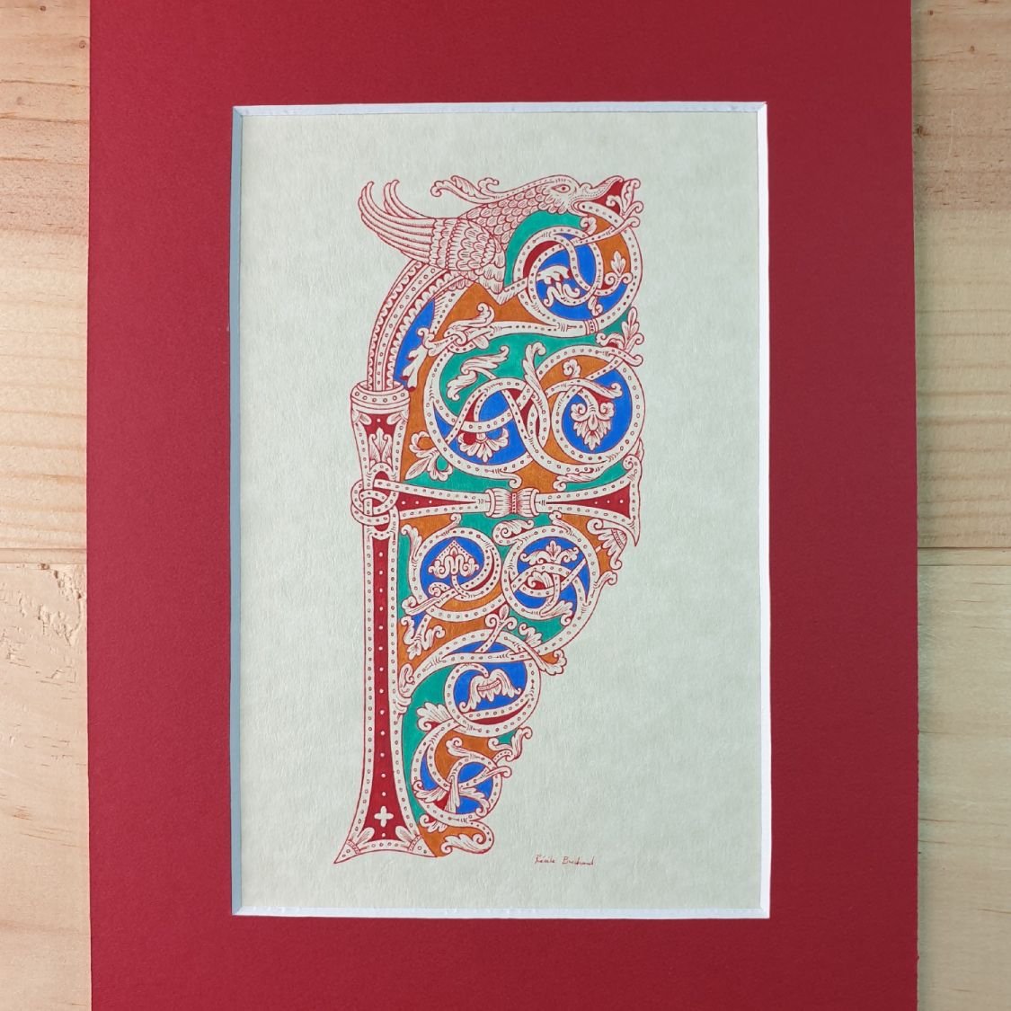 Verlichte letter F in Romaanse stijl