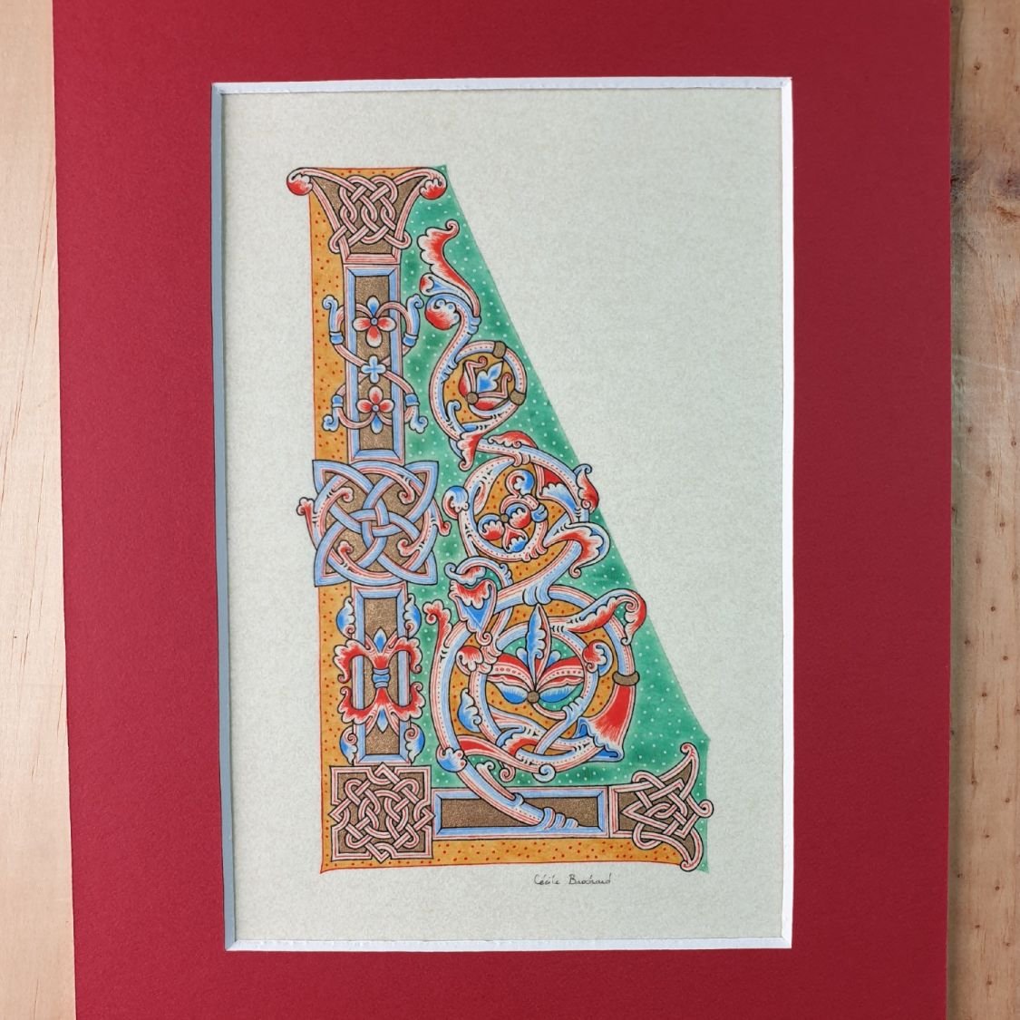 Verlichte letter L in Romaanse stijl
