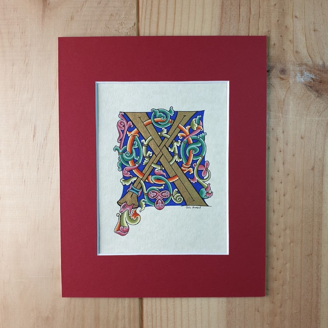 Romaanse verlichte letter X