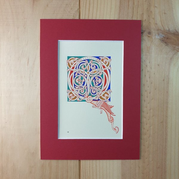 Verlichte letter Q in Romaanse stijl