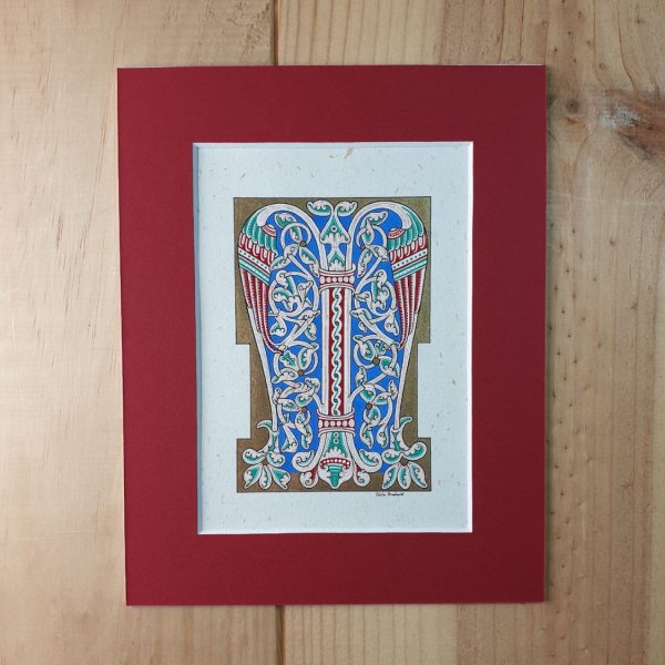 Verlichte letter M in Romaanse stijl