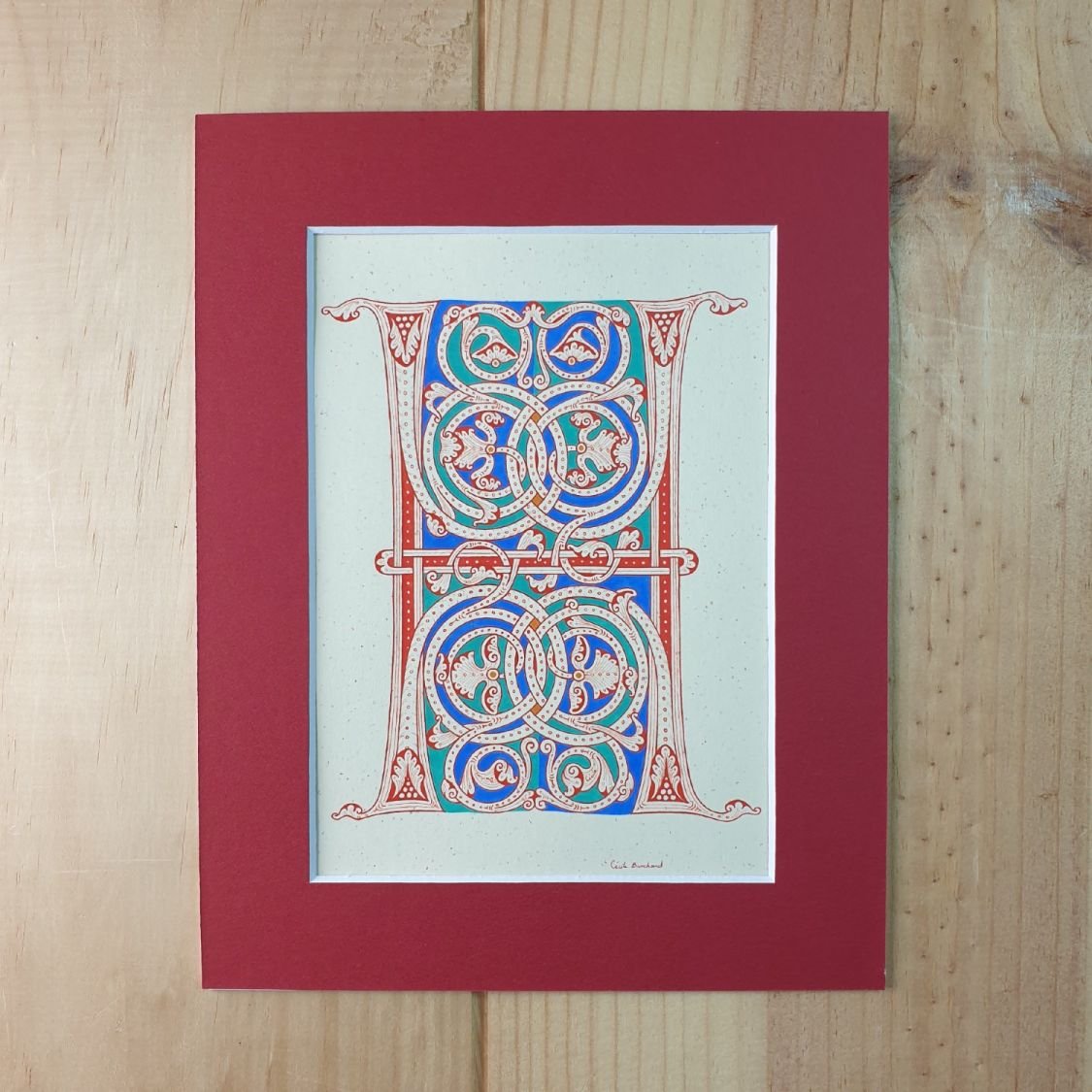 Verlichte letter H in Romaanse stijl
