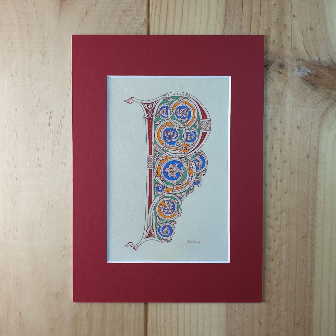Verlichte letter P in Romaanse stijl