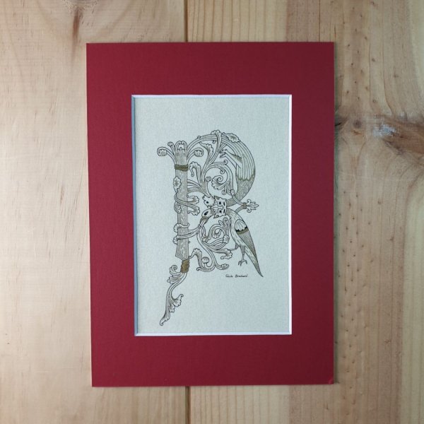 Verlichte letter R in Romaanse stijl