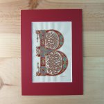 Verlichte letter B in Karolingische stijl