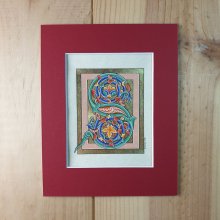 Verlichte letter S in Romaanse stijl